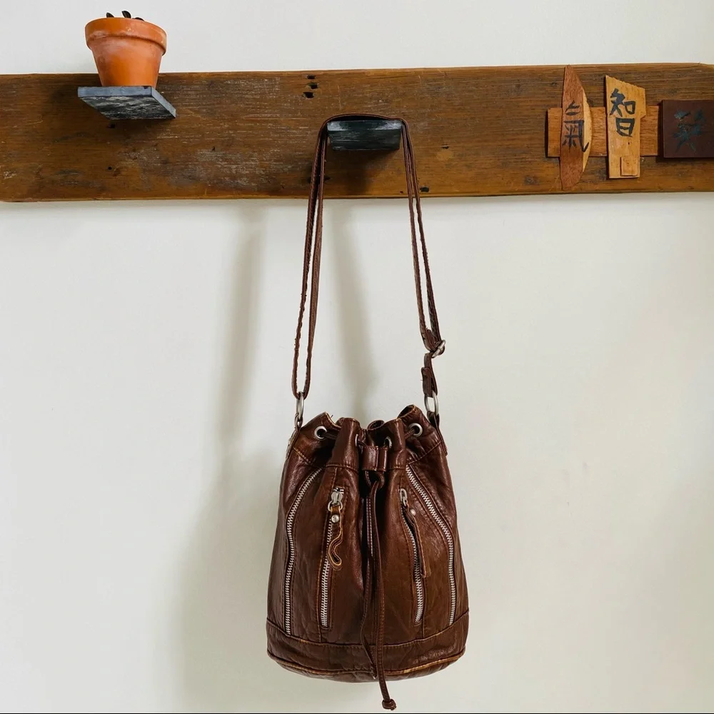 Faux leather bucket bag with zipper detail